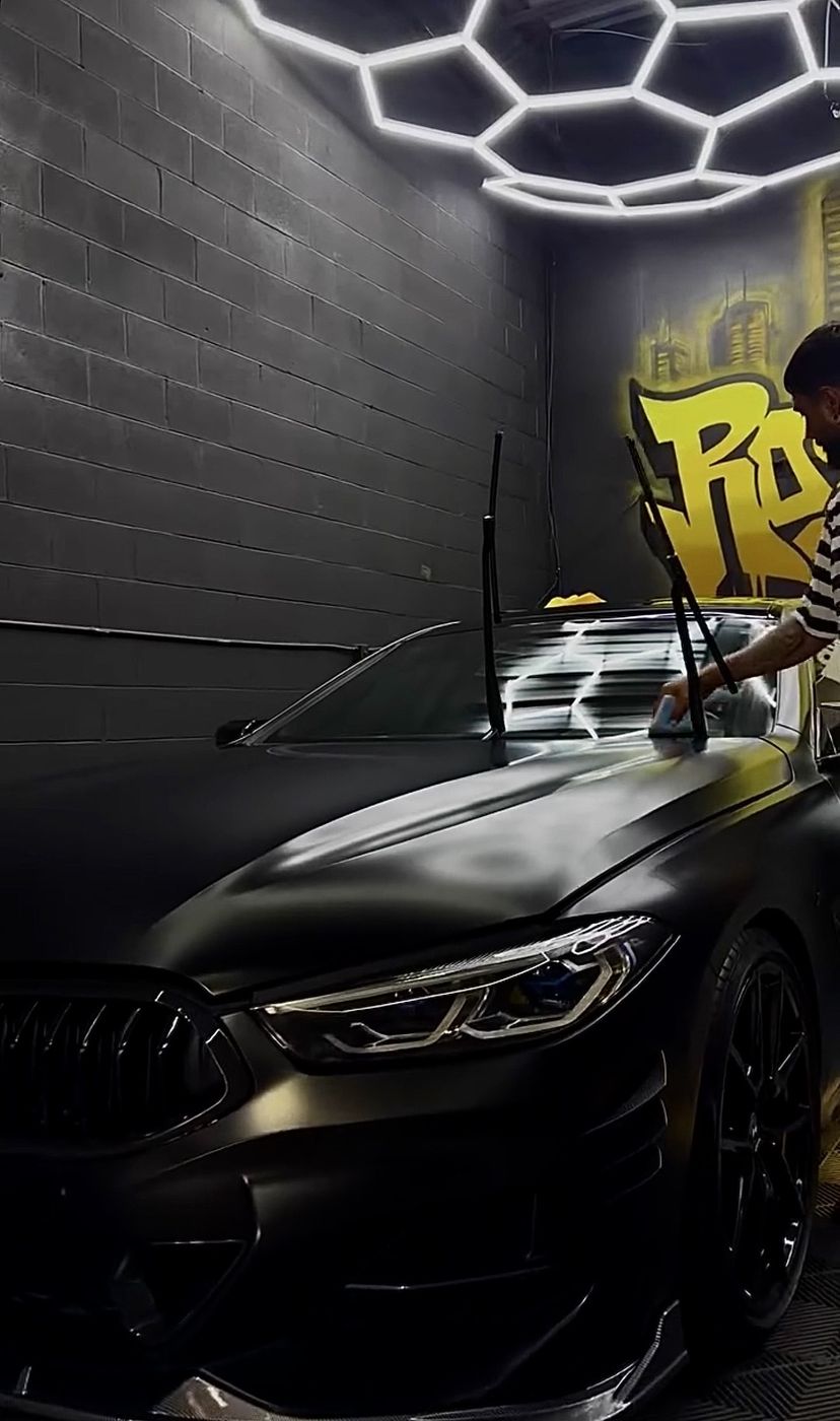 BMW M8 receiving a full ceramic coat in the shop