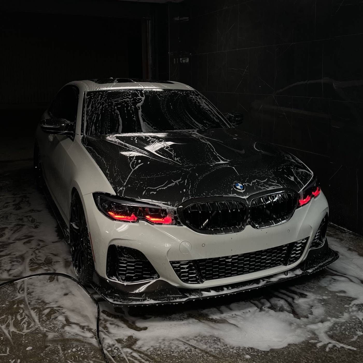 BMW under foam during detailing