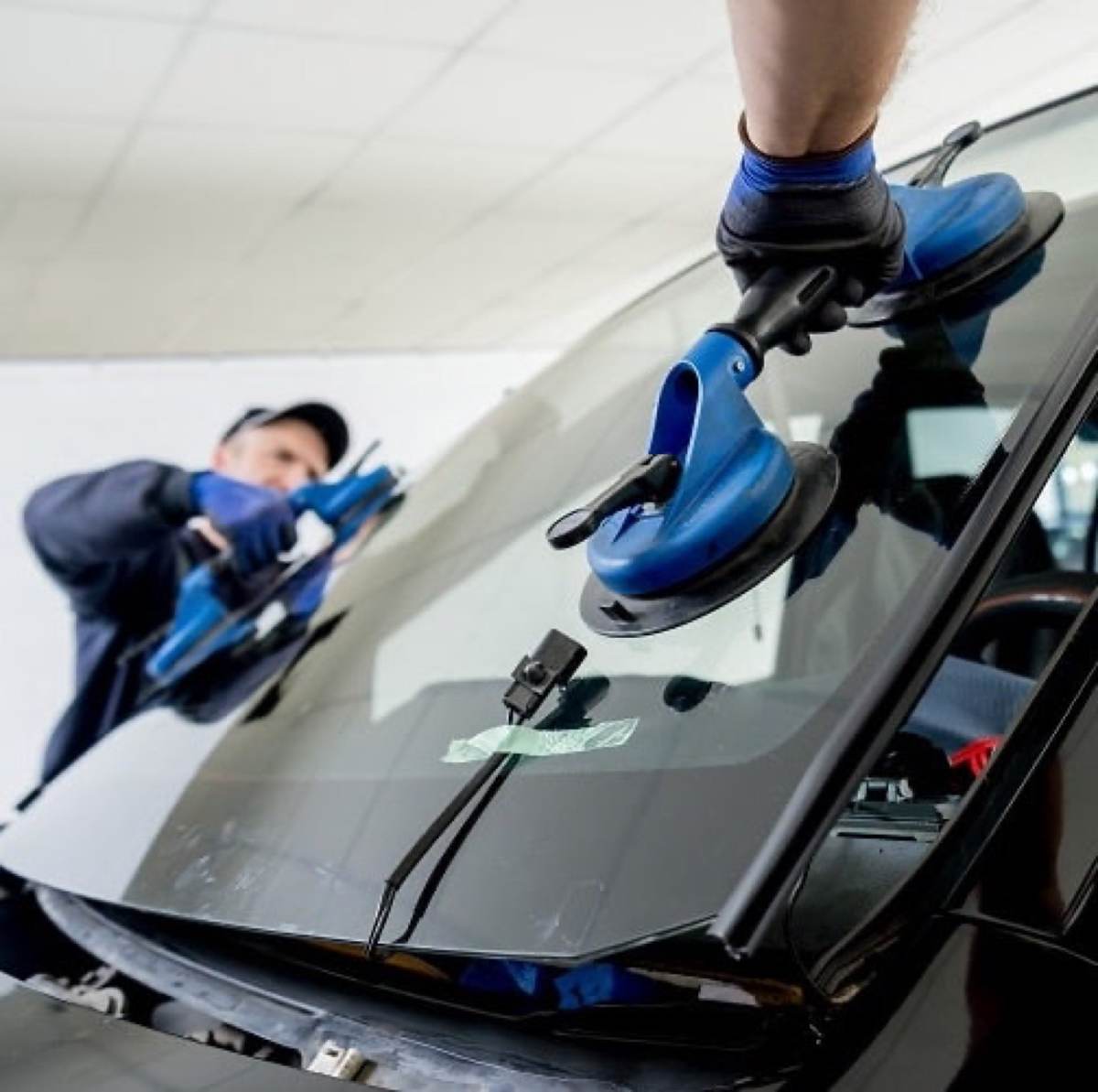 Windshield replacement in progress